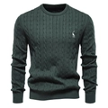 Close-up of dark green cable knit sweater featuring white giraffe embroidery detail - Green
