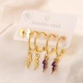Detail of gold and purple enamel lightning bolt earrings on stainless steel display card - 3 Pairs Purple Lightning Set