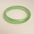 Detailed view of a translucent pale green cat-eye stone bangle with smooth finish - Light Green Bangle With Exquisite Gift Box / Inner Diameter 6.2cm