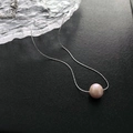 Pink pearl necklace with silver-tone chain on black surface for elegant woman - Purple Big Pearl Silver Tone Necklace