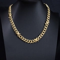 Detailed close-up of gold barbed wire style cuban link necklace on a black bust - 50cm / Gold Necklace