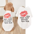 Detail of white mesh pet t-shirt featuring a red lip print and artistic black lettering - White Lip Print