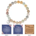 Detail of 8mm natural stone bead bracelet with heart charm and healing greeting cards - Amazonite
