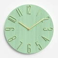 Minimalist round wall clock featuring mint green textured dial and gold wire numbers - Bean Green With Champagne Gold Numbers