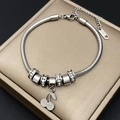 Detail of silver stainless steel snake chain bracelet with cherry charm and crystals - Cherry Style (8454)
