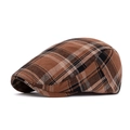 Detailed side view of vintage plaid newsboy cap featuring brown and beige cotton fabric - Adjustable / Brown Plaid