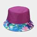 Close-up of a tie-dye bucket hat featuring a purple top and vibrant colorful brim - M (56-58cm) / Purple
