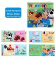 Detail of colorful animal illustrations and numbers in a soft baby educational cloth book - Numbers Cognition