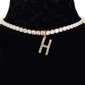 Silver choker necklace with sparkling zircon H-letter pendant on a black bust display - Letter H [Gold]
