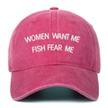 Close-up view of a pink vintage washed baseball cap with white FISH FEAR ME embroidery - One Size(Adjustable) / Rose Red