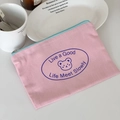 Close-up of pink canvas drawstring bag with cute bear print and light blue zipper detail - Mocha Bear Storage Bag