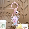 Pink cat paw liquid keychain with macaron beads, bells, and pink hardware - Pink Mouse Milk Bean