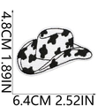 Detailed view of cowboy hat embroidery patch with black and white cow print texture - 6.4x4.8cm