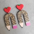 Detailed view of handmade teacher earrings featuring red apple studs and leopard rainbow pencils - Apple Decor Leopard Pencil