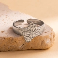Polished silver adjustable open ring featuring an intricate hollow butterfly design - Steel Color 101