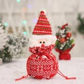 Knitted Santa Claus drawstring gift bag with white reindeer pattern and striped hat - Woolen Santa Bag