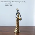 Afrikanische Frauenfigur in goldnem Kleid mit Krug, kleine Harzfigur für Deko - Stehend Linke Hand Krug Haltend (Klein)