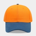 Close-up of two-tone cotton baseball cap with orange panels and navy blue brim stitching - Adjustable / Orange with Blue Visor