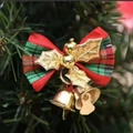 Christmas bow ornament featuring red and green plaid fabric with gold bells and holly leaves - Christmas Bow Style