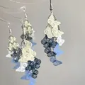 Detail van gelaagde hars vlinder kwastje oorbellen met blauw en geel kleurenpalet - 6# Oorhaakje - Blauw & Wit - Vlinder kwast