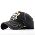 Close-up of distressed cotton baseball cap with DOG Vibes Only embroidery patch - Adjustable / Black