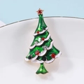 Detail of Christmas tree brooch with green enamel and rhinestones on a white plate - Style 39 (4.6*2.5cm)