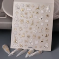 Detalle de pegatinas navideñas para uñas con copos, renos y árboles dorados en relieve - CO-323 Estampado en oro