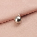 Detail of a polished silver round ball pendant charm made of high-quality stainless steel - 3mm / Silver