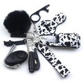 Neoprene personal safety alarm keychain set with cow print lipstick holder and wristlet - Cow Print (Style 30)