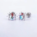 Macro detail of spider stud earring with heart-shaped crystal and screw back design - Single Spider
