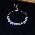 Elegant silver adjustable slider bracelet with oval-cut clear cubic zirconia stones - Silver Oval Style / Silver
