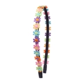 Black fabric headband featuring colorful embroidered daisy flowers in a cute floral style - Colorful