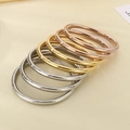 Set of 6mm 18k gold plated stainless steel bangles in gold, silver, and rose gold - Tricolor 7-Piece Set