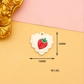 Detailed macro view of heart-shaped strawberry alloy pendant charm with 16mm dimensions - Strawberry Heart