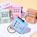 Mini slot machine keychain set in mint green, pink, sky blue and brown finishes - Capybara Series With Gold Clasp And Bell / 1000 Minimum Order