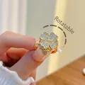 Rotatable four-leaf clover ring in gold finish with sparkling pavé cubic zirconia - Heart Clover Rotatable Style (H001)