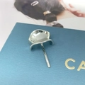Polished silver shell-shaped metal hair hook accessory on a blue jewelry box - Silver #9
