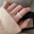 Minimalist silver twist ring for women with vintage textured design on a hand - JZ0858 (Thick Twisted)