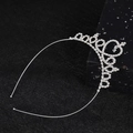Silver rhinestone princess crown headband with heart design for girls on dark stone - White