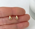 Polished gold teardrop stud earrings in 925 sterling silver shown for size reference - Water Drop / Gold