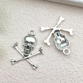 Silver skull and crossbones alloy charm for DIY jewelry making with front and back view - Halloween Skull 20x24mm