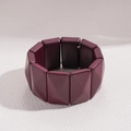 Macro shot of burgundy acrylic square blocks on an elastic cord bracelet with glossy finish - Glossy / Burgundy