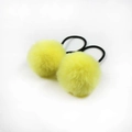 Set of two bright yellow faux fur pom pom hair ties with black elastic bands for girls - Yellow