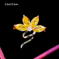 Detail view of 2.5cm floral brooch with yellow crystals and micro-set cubic zirconia - Yellow Gem Floral Style (B753)