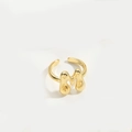 Adjustable gold plated open ring featuring an abstract lava style letter M design - Gold Letter M