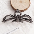 Pinza para el pelo de araña metálica negra para Halloween sobre fondo con textura - Color gunmetal
