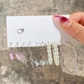 6-pair earring set featuring pink butterfly, snake charms, and pearl hoops displayed on card - Silver 6-Pair Set - Butterfly Snake Pearl