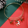 Adjustable golden Christmas bracelet with reindeer pendant and festive red green beads - White Reindeer (D1370)