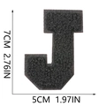 Detailed close-up of 7cm black chenille letter J patch with embroidered texture and size marks - Letter J / Black