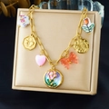Close-up of gold enamel necklace pendants featuring flowers, butterflies and heart charms - Pendant Necklace (N3794)